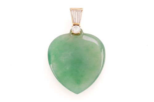Lot 35 - A heart-shaped jade pendant, in dull grey-ish...