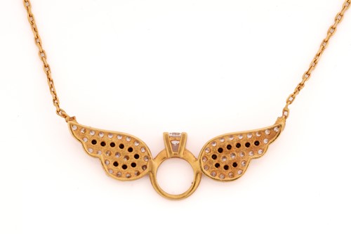 Lot 71 - A necklace with a winged engagement ring...