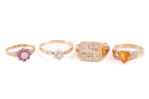 Lot 122 - A collection of four 9ct gold rings comprising...