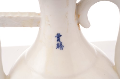 Lot 218 - A Chinese Qinbai-style porcelain wine ewer and...