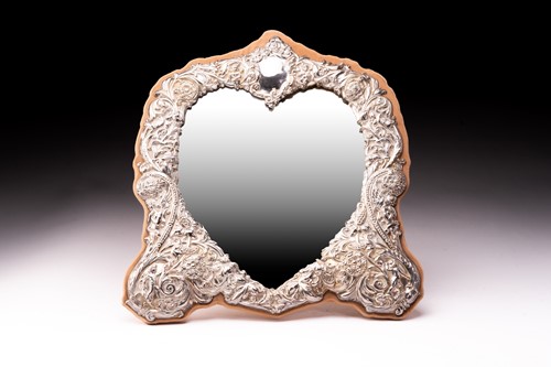 Lot 330 - A heart-shaped silver frame dressing table...