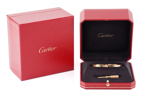 Lot 39 - Cartier - A diamond-set 'LOVE' bangle in 18ct...