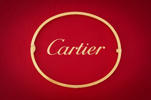 Lot 39 - Cartier - A diamond-set 'LOVE' bangle in 18ct...