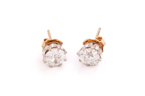 Lot 183 - A pair of diamond solitaire stud earrings,...