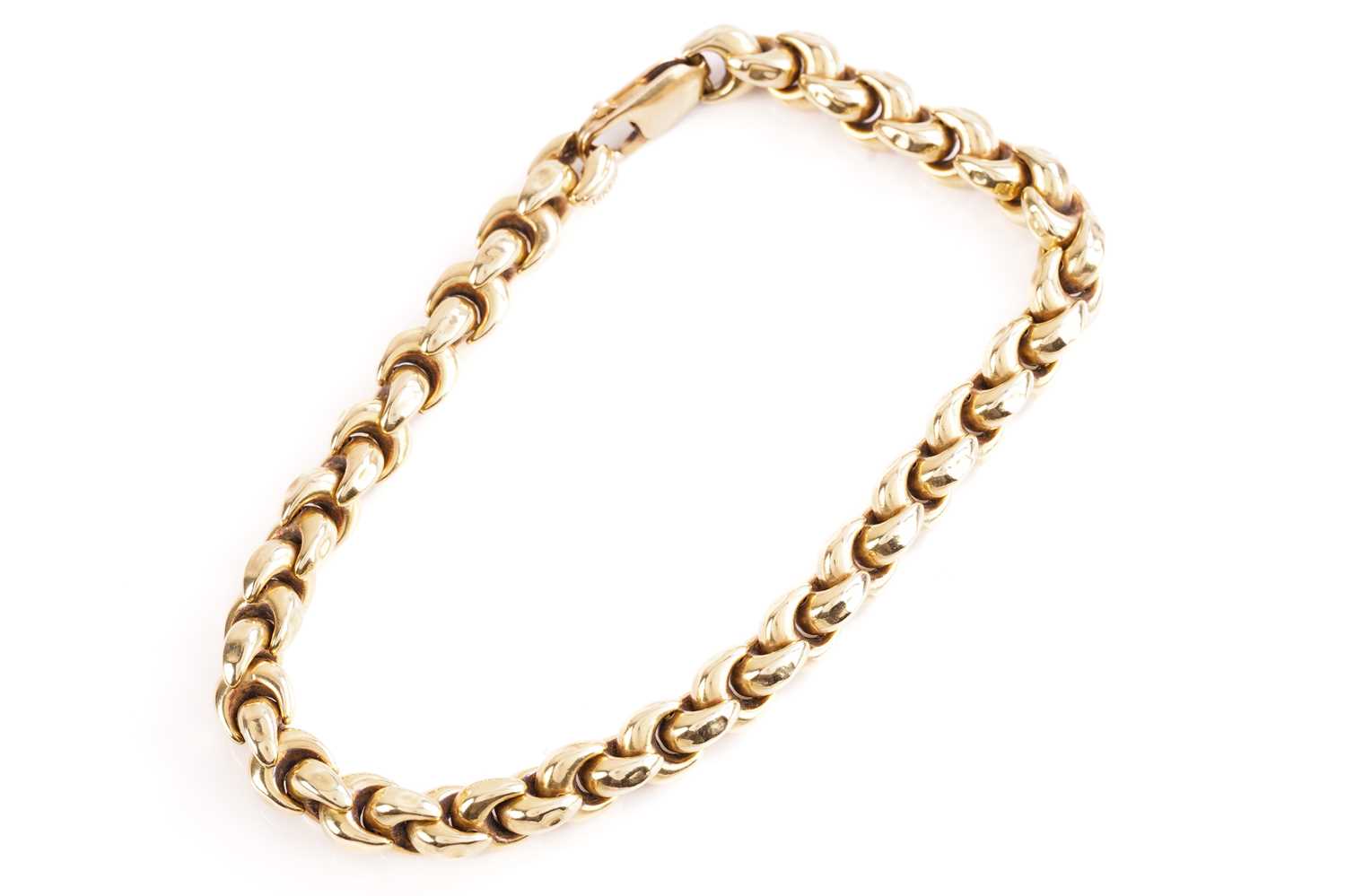 Lot 235 - An Italian fancy link bracelet of curved