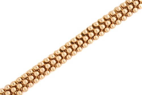 Lot 317 - An 18 carat gold three row choker length...