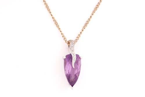 Lot 30 - A single stone amethyst and diamond pendant;...