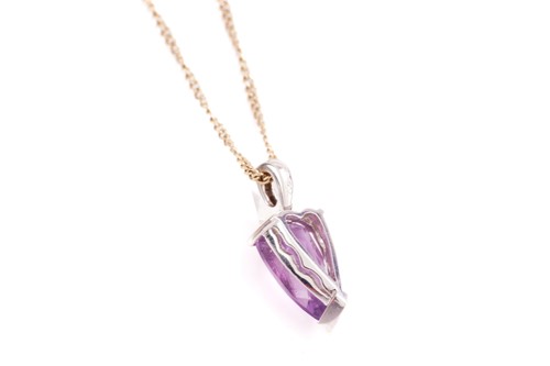 Lot 30 - A single stone amethyst and diamond pendant;...