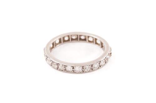 Lot 51 - A diamond eternity ring, contains twenty-one...