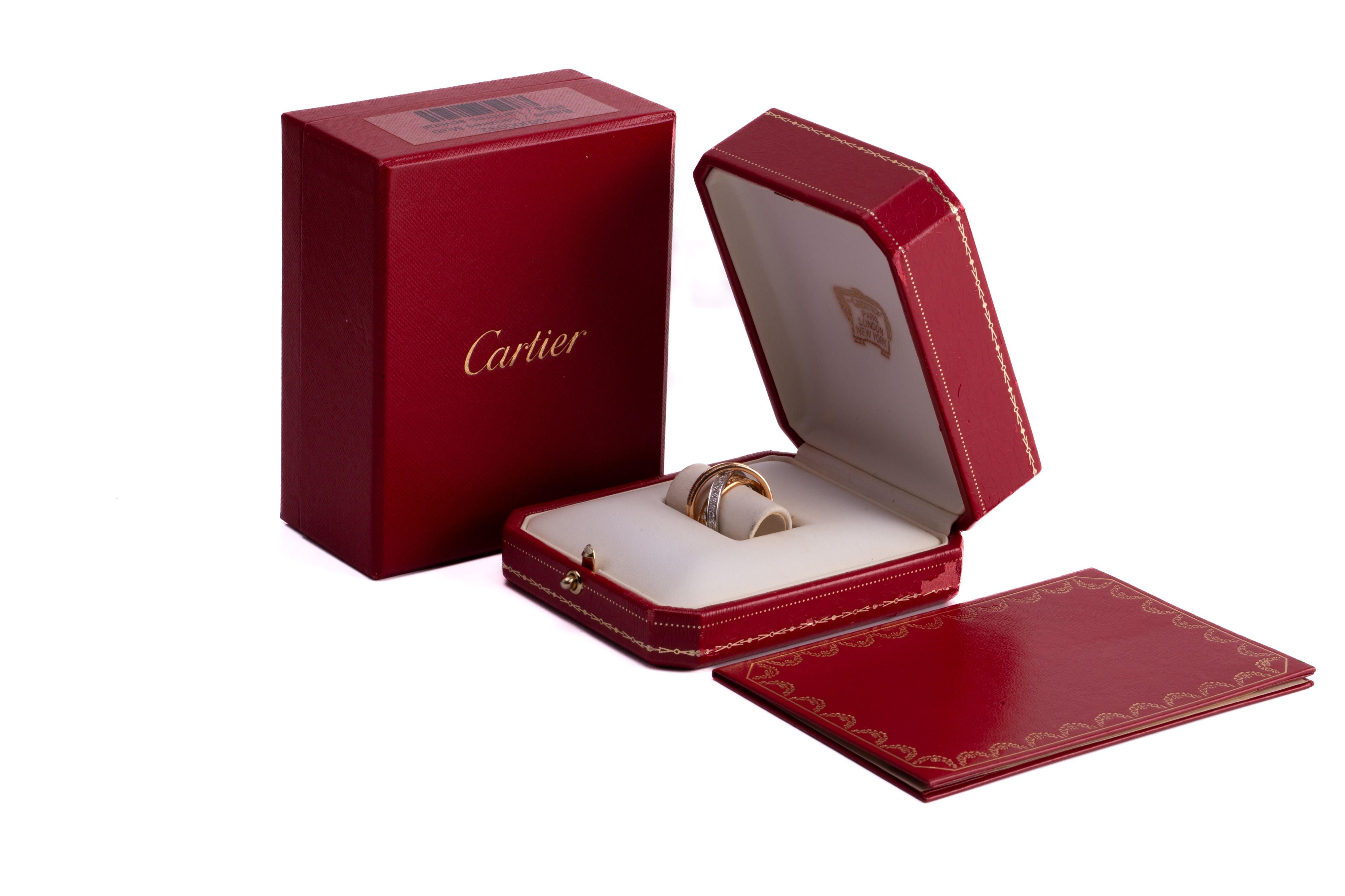 Lot 1 Cartier Trinity diamond ring containing