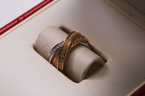 Lot 1 - Cartier - 'Trinity' diamond ring, containing...