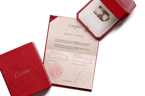 Lot 1 - Cartier - 'Trinity' diamond ring, containing...