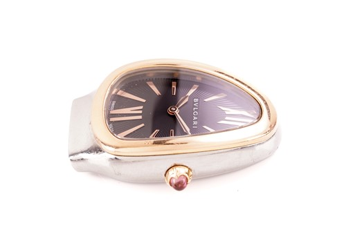 Lot 413 - A Bvlgari serpentine bi-metal quartz movement...