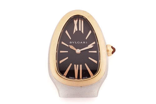 Lot 413 - A Bvlgari serpentine bi-metal quartz movement...