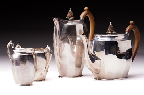 Lot 517 - A 1930s four-piece silver tea set, Sheffield...