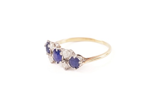 Lot 64 - A sapphire and diamond dress ring, consisting...