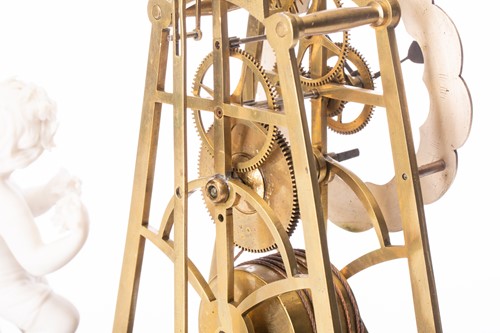 Lot 360 - A late Victorian brass skeleton timepiece...