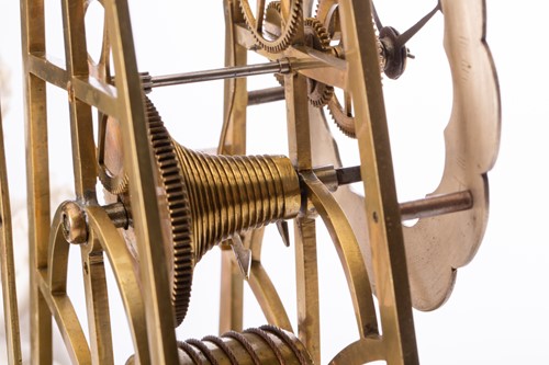 Lot 360 - A late Victorian brass skeleton timepiece...