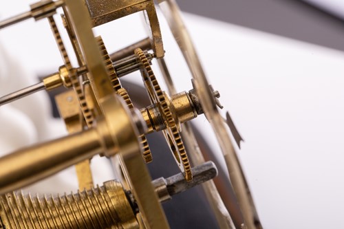 Lot 360 - A late Victorian brass skeleton timepiece...