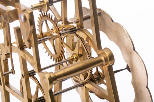 Lot 360 - A late Victorian brass skeleton timepiece...