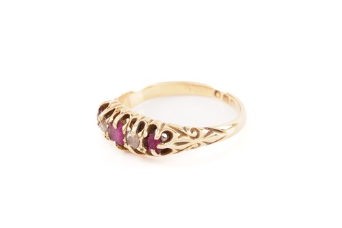 Lot 59 - A five-stone half-hoop ring set with rubies...