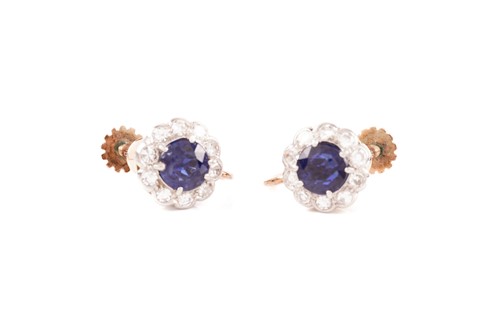 Lot 244 - A pair of diamond and sapphire cluster...