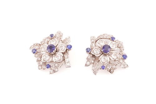 Lot 43 - A floral duette brooch set with sapphires and...