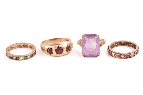 Lot 268 - Four gem-set rings in 9ct gold; including an...