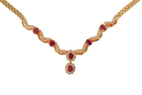 Lot 88 - A ruby and diamond necklace, the pendant...