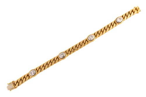 Lot 253 - A diamond-set curb link bracelet, featuring a...