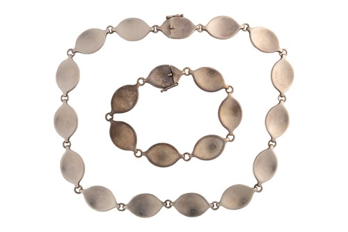 Lot 367 - Georg Jensen - A necklace and bracelet suite,...