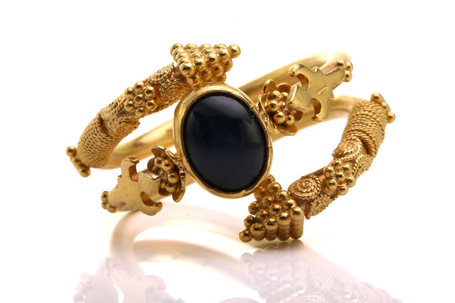 Lot 313 - An Etruscan style open ring, of spiral form,