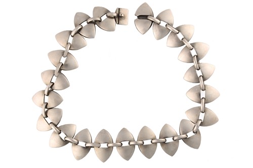 Lot 373 - Georg Jensen - A necklace with twenty-one...