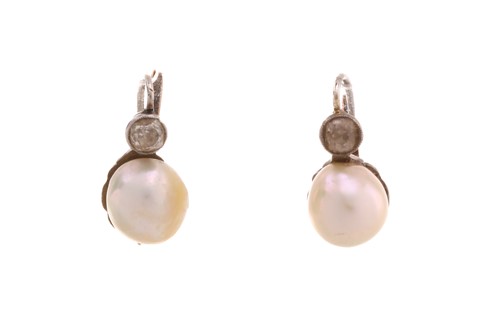 Lot 195 - A pair of pearl and diamond earrings, each...