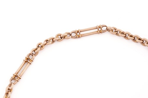 Lot 73 - A 9ct pink gold Albert chain with fob seal,...