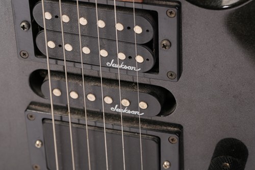 Lot 376 - A Jackson EMG electric guitar, in black finish...