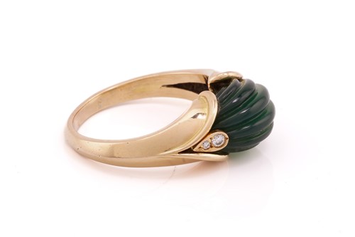 Lot 289 - Van Cleef and Arpels. A carved green...