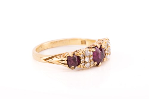 Lot 6 - A late Victorian ruby and diamond half-hoop...