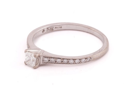 Lot 296 - A single stone diamond ring; the round...