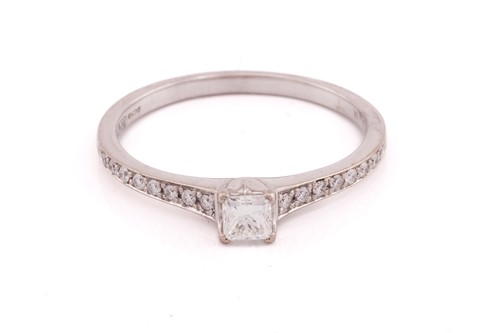 Lot 296 - A single stone diamond ring; the round...