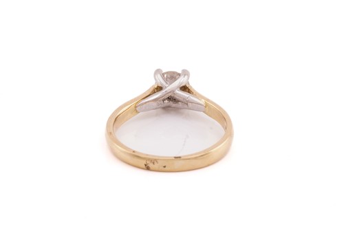 Lot 152 - A single stone diamond ring; the round...