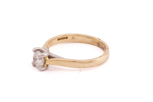 Lot 152 - A single stone diamond ring; the round...