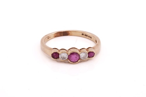 Lot 358 - A five stone ruby and diamond half hoop ring,...