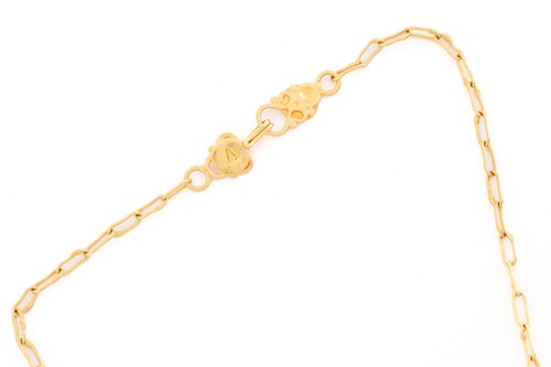 Lot 325 - A yellow gold filigree necklace, set with...