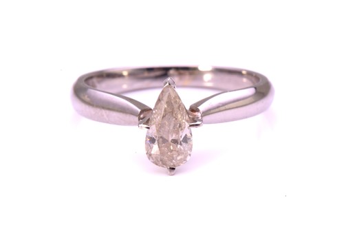 Lot 113 - A pear-shaped diamond solitaire ring,...