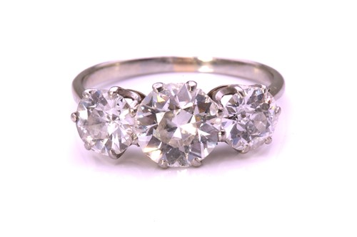 Lot 360 - A diamond trilogy ring, comprising three...