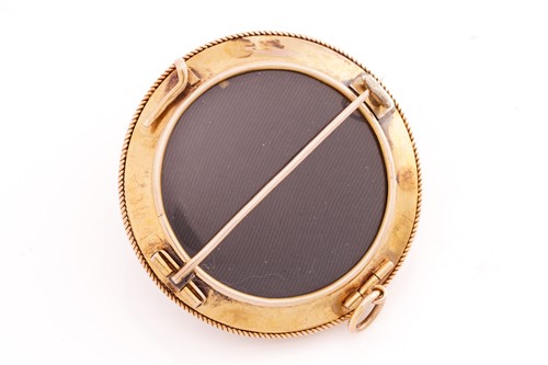 Lot 337 - A Victorian mourning brooch, of domed circular...