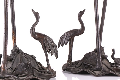 Lot 238 - A pair of Japanese bronze two branch...