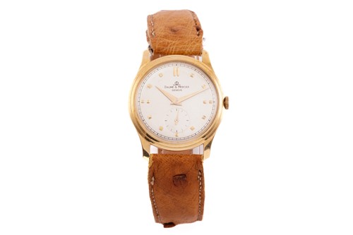 Lot 407 - A Baume and Mercier gold wristwatch circa 1950,...