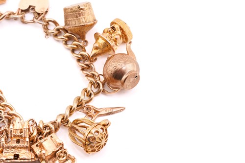 Lot 79 - A 9 carat gold charm bracelet; the curb...